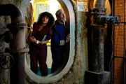 L-R: Billie McEvoy (Lenora Crichlow) and Ryan Clark (Hugh Laurie)