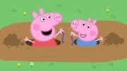 Peppa und Schorsch (r.) spielen im Matsch und haben eine Menge Spaß.