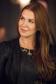 Carrie Wells (Poppy Montgomery)
