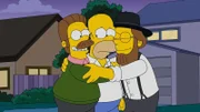 Als ihr Auto auf dem Weg zu Lisa kaputtgeht, treffen Homer (M.), Bart, Maggie und Marge auf Neds Cousin. Doch schafft es Homer, die Zerstrittenen wieder zu vereinen?