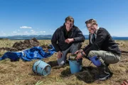Dan Snow and satellite archaeologist Dr. Sarah Parcak excavating at Point Rosee, Newfoundland