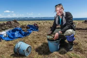 Satellite archaeologist Dr. Sarah Parcak excavating at Point Rosee, Newfoundland