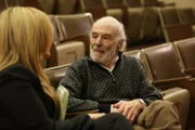 Bennett Gerhsman stares at Melissa Lewkowicz.