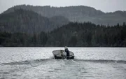 PORT PROTECTION, ALASKA- Gary drives his boat to the place where he wants to forage for clams.