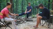 Justice, Maddox and Curen trying to light a fire