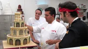 Buddy putting the finishing touches on the Gladiators and Goddesses cake.
