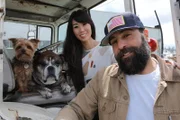 Antonio Ballatore and Grace are with their dogs Chewy and Griffy.