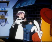 Mrs. Spiceham, die Köchin, zeigt Alice wie man Karamelbonbons macht.