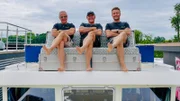 Family Groß sitting on a Boat