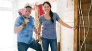 Hosts Chip and Joanna Gaines pose for a portrait while demolishing the entryway of the Bed and Breakfast, as seen on Fixer Upper.