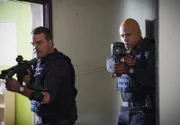 G. Callen (Chris O'Donnell, l.); Sam Hanna (LL Cool J, r.)