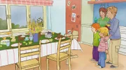 Conni und Anna freuen sich über den hübsch dekorierten Kressetisch mit Katze.