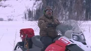Mark on a snowmobile.