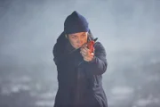 Liz (Megan Boone)