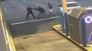 Leon Wright and another good Samaritan fighting off perp