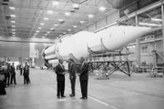 Dr. Wernher von Braun, left, briefs President John Kennedy, center, and Vice President  Lyndon Johnson at the assembly plant of the huge Saturn rocket on Sept. 11, 1962 at Huntsville, Alabama. (AP Photo)