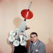 Wernher von Braun / Subject: Scientist Wernher Von Braun with model of moon rocket he designed. Photographer- Ralph Crane Time Life Staff Merlin-1151192