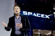HAWTHORNE-CA-MAY 29: SpaceX CEO Elon Musk unveils the company's new manned spacecraft, The Dragon V2, designed to carry astronauts into space during a news conference on May 29, 2014, in Hawthorne, California. The private spaceflight company has been flying unmanned capsules to the Space Station delivering cargo for the past two years. The Dragon V2 manned spacecraft will ferry up to seven astronauts to low-Earth orbit. (Photo by Kevork Djansezian/Getty Images)
