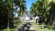 Front exterior of Holt house as seen on Hawaii Hunter (exterior)