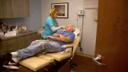 Medical Assistant Kristi bandages up Art after surgery.