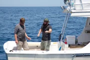 Eric Young and Tom McLaughlin set the hand line.