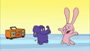 Hase und Elefant haben viel Spaß bei Musik und Tanz.