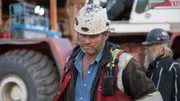 Sheamus Christie looking pensive and Tony Beets in the background checking the dredge.