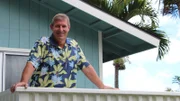 Home buyer Doug Davis on the porch of the Oluolu St house as seen on Hawaii Hunters (portrait)