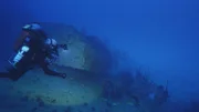 One of the divers find the underwater remains of the SAKAWA.