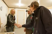 Tony Beets shaking Parker's hand.