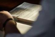 NTSB investigators look into the pilots' files of the collided North Airlines Flights 1482 and 299.