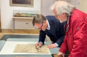 Manfred Müller von M&R Karthografie und Sven Ballenthin, Archivar