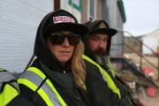 Karla Charlton wearing sunglasses and Ryan Hofer.