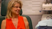 Janice speaks with Cheri in the examination room.