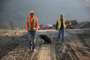 Parker walking with Dean Tosczak and dozer (dog).