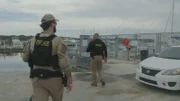 CBP-AMO-Agenten gehen auf dem Weg zur Durchsuchung in Mayagüez, P.R., zum Dock.