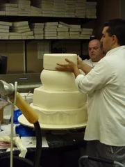 Fast Food Groom's cake and Beer Boot cake. Buddy and Mauro Castano begin stacking the wedding cake for Buddy's sister-in law Daniela.