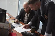 L-R: Willie Henderson (Donnell MacKenzie), Detective C. Rodriguez (David Thompson)