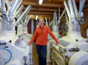 Bis heute betreiben die Brüder Andreas und Karl Kuhn die Mühle der Familie gemeinsam. Die durch Tauberwasser angetriebene Mühle mahlt Getreide, die ebenfalls durch Wasserkraft angetriebene Turbine produziert Strom, 20 % des Energiebedarfs von Markelsheim können so mit sauberer Energie direkt aus der Nachbarschaft gedeckt werden.