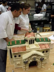 Buddy and Sunshine work on the Bronx Zoo cake.