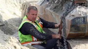 Tupper helping chain up washplant