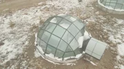 In Finnisch-Lappland lassen sich in Glas-Iglus Polarlichter bestaunen.