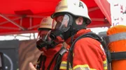 Two firefighters before the stair run in Berlin.