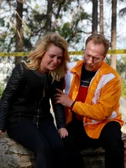 Confronting daughter at the murder scene when she finds out her mom is dead.