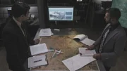 REENACTMENT - The Main Investigator (played by RJ Parrish) and an investigative assistant review CCTV footage of US-Bangla Airlines Flight 211's crash landing.