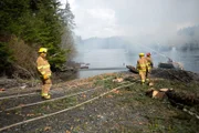 PORT PROTECTION, ALASKA- Sam Carlson and his fellow firemen engage in a fire drill to test their equipment and response. (Photo Credit: National Geographic Channels/Corey Cooper)