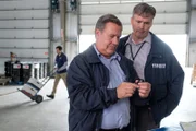 TSB Investigators Mike Cunningham (played by Judah Katz) and Alan Chaulk (played by Glen McDonald) receive a flash drive with vital information towards finding out what downed Cougar Helicopters Flight 91.