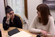 Amy Bruni talks with homeowner Nicole Santley during the evidence reveal.