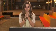Recre – Irene praying at church.