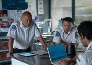 REENACTMENT - The Main Investigator (played by Von Flores) and another KNKT investigator (played by Allen Keng) listen to the cockpit voice recorder of downed Lion Air 610.